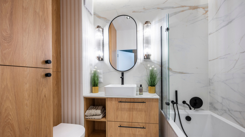A bathroom with a rectangular vessel sink