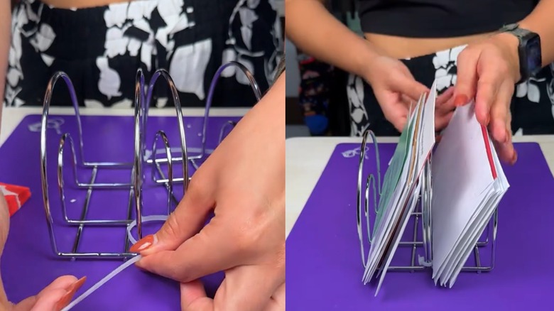 Woman organizing mail in Dollar Tree napkin holder on tabletop