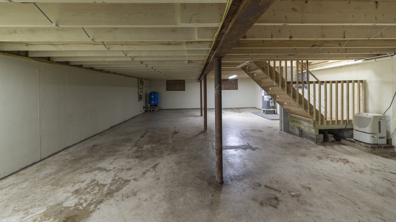 Unfinished basement inside home.