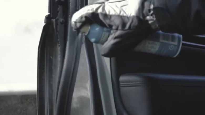 Applying cooking spray to a car door seal