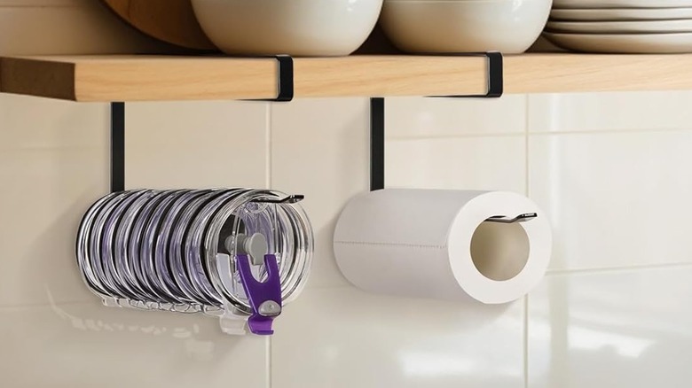 A Jolensoy Tumbler Lid Organizer on a shelf in a kitchen
