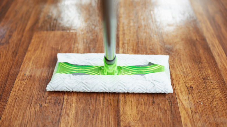 a Swiffer on a wooden floor
