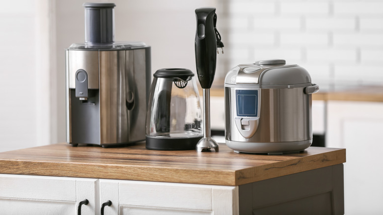 Collection of new countertop appliances on a kitchen island
