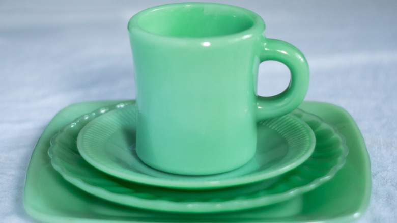 A jadeite mug and saucers