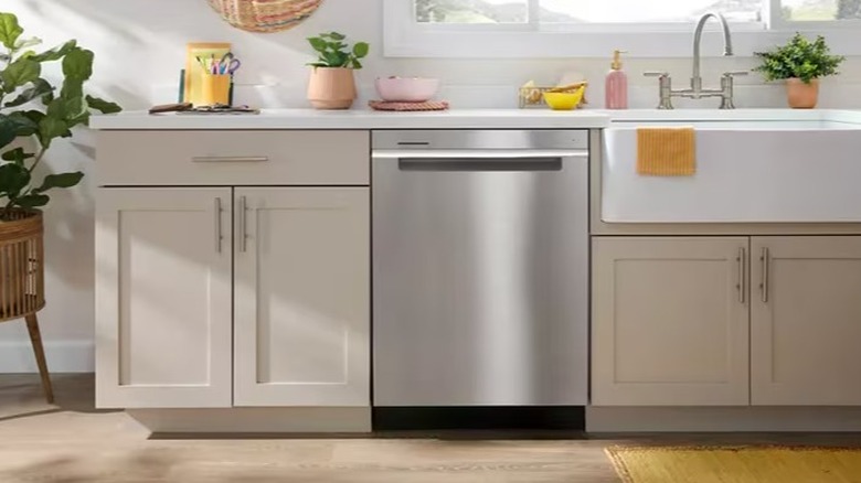 A stainless steel dishwasher in a kitchen