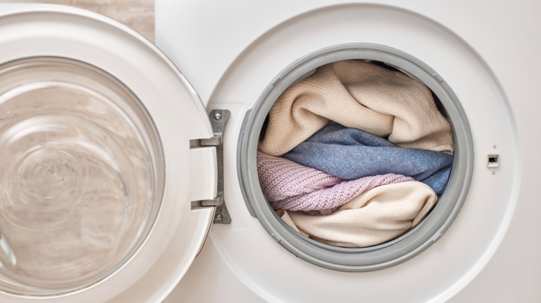 Clothes dryer full of fabric