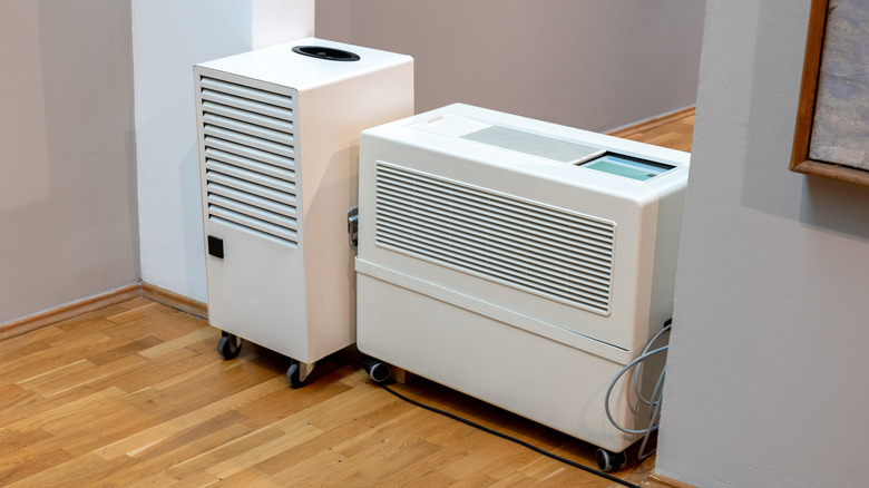 A large dehumidifier and air purifier in a hallway