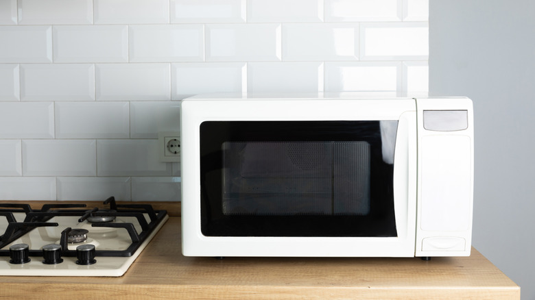 White microwave on a counter