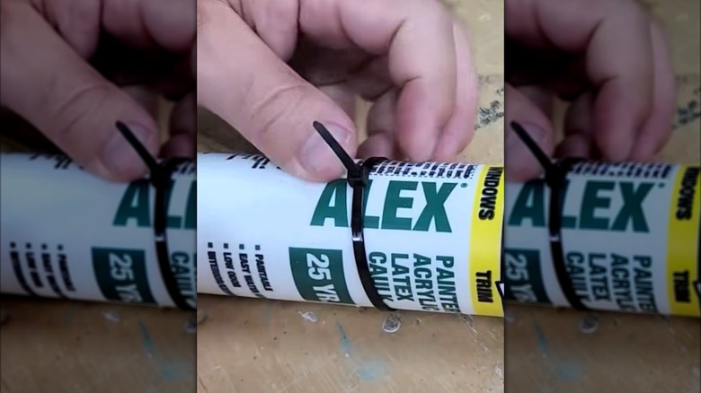 Zip tie on bottle to stop it from rolling away