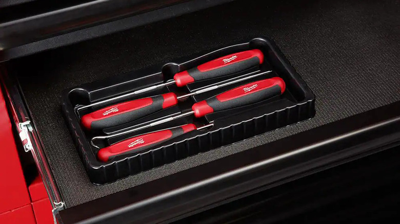 A Milwaukee Hook and Pick Set sits on a black counter