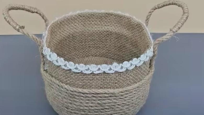 Small burlap-lined basket made from plastic bottle