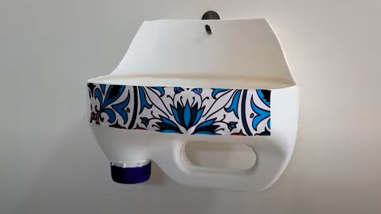 Bathroom organizer made from a plastic milk jug