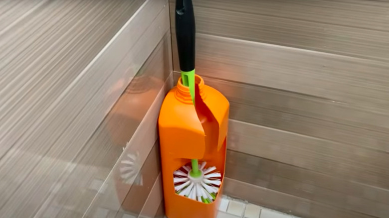 Toilet brush holder made from half-gallon milk jug