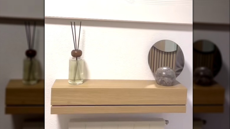 IKEA DIY wooden picture ledge as modern hidden shelf with hinge
