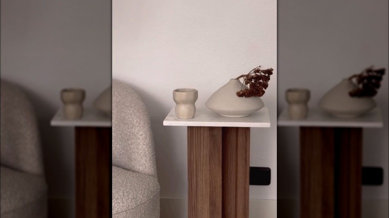 Wood picture ledges glued to marble square to make modern end table with contemporary vase decor