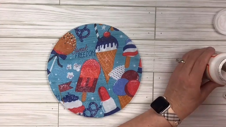 Festive trivet covered in scrap piece of repurposed scarf