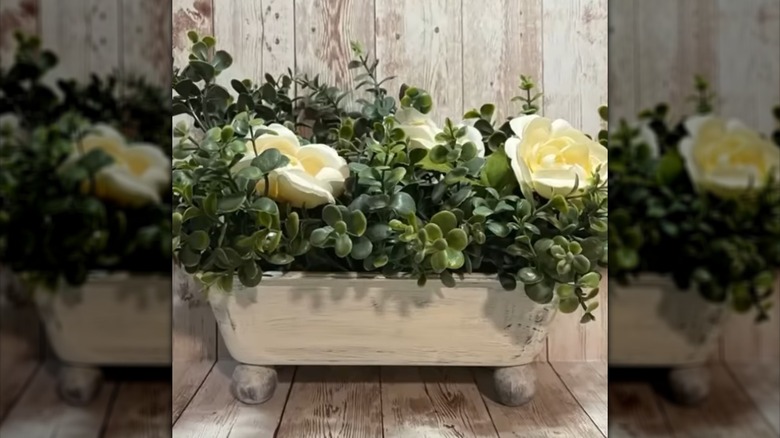 An upcycled bread pan used as farmhouse decor