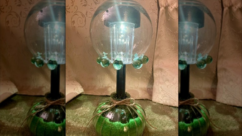 Eccentric light decoration made from Dollar Tree glass vase and other items
