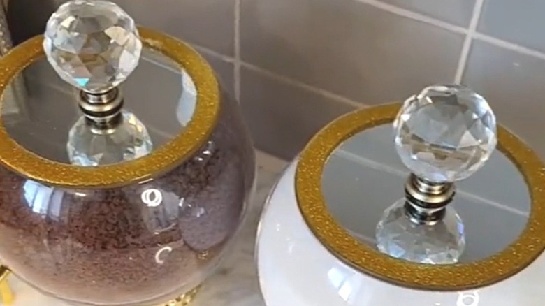 Glass vases with glitter and mirrors with coffee ingredients