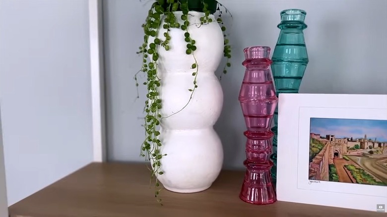 DIY modern bubble vase with hanging vine on tabletop