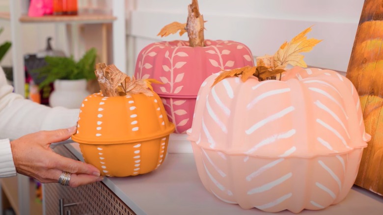 Double Bundt pans transformed into brightly painted pumpkins