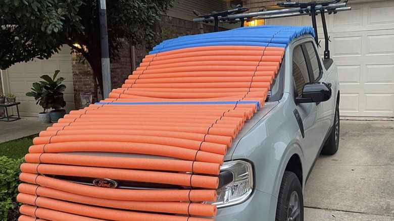 Truck covered with pool noodles
