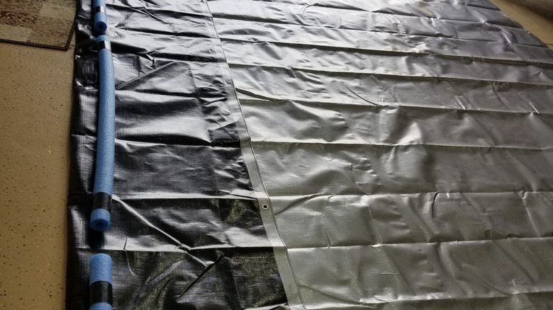 Floor dam tarp made with pool noodles