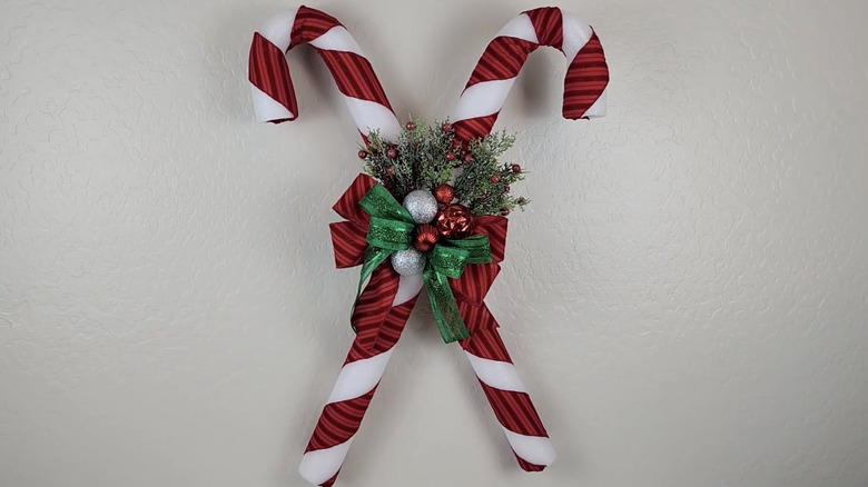 DIY festive candy canes made from pool noodles