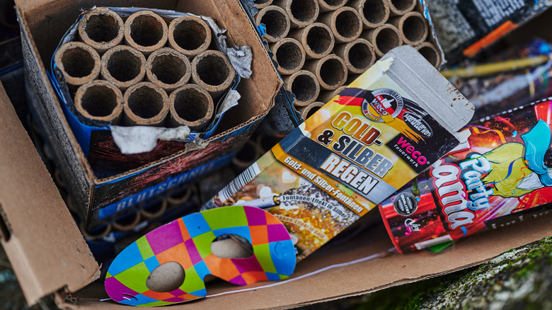 A box is full of leftover fireworks