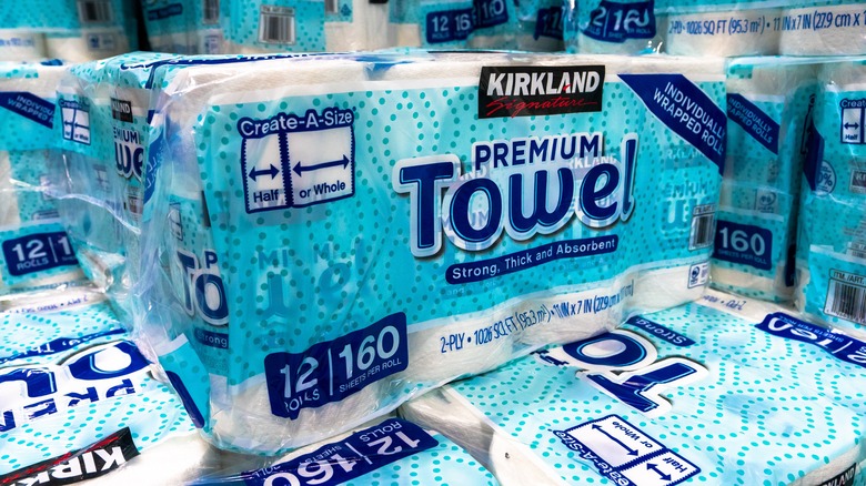 Kirkland paper towels are stacked in a large pile