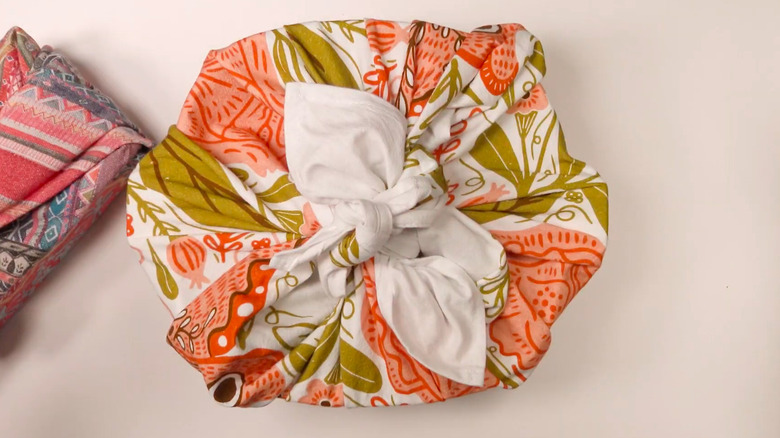 Gift wrapped in a printed tea towel