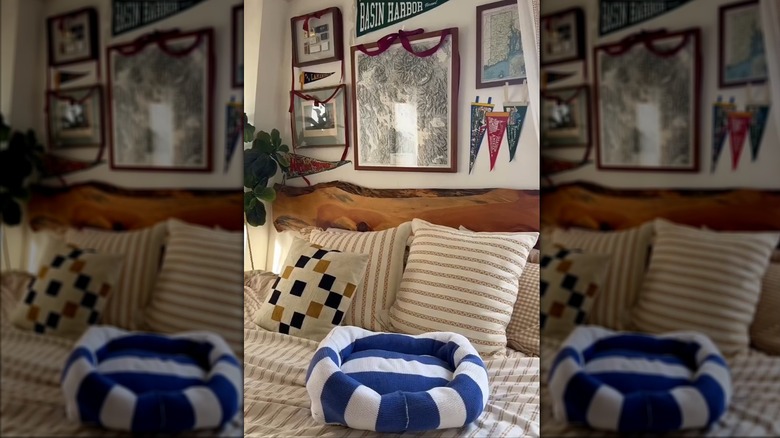 Striped blue and white pet bed on classic bed