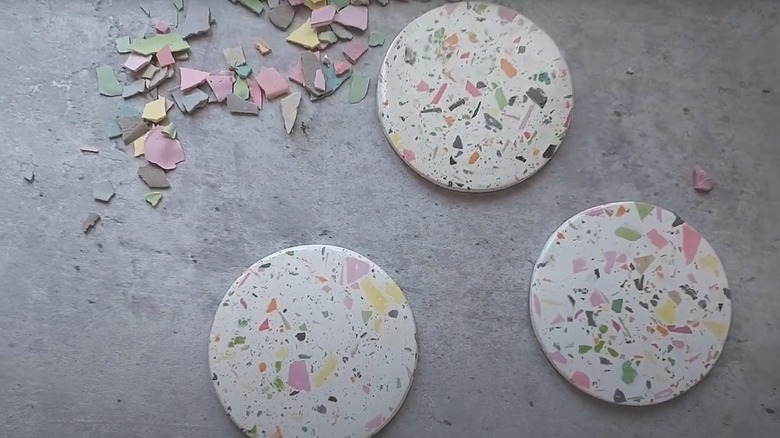 Terrazzo-style coasters made from plaster, paint, and lids