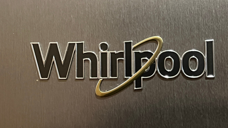 A Whirlpool logo on a refrigerator