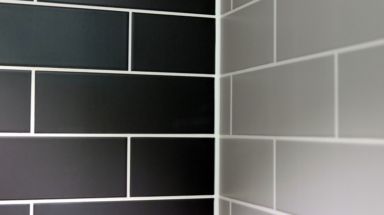 dark and bright horizontal tiles with high contrast white grout