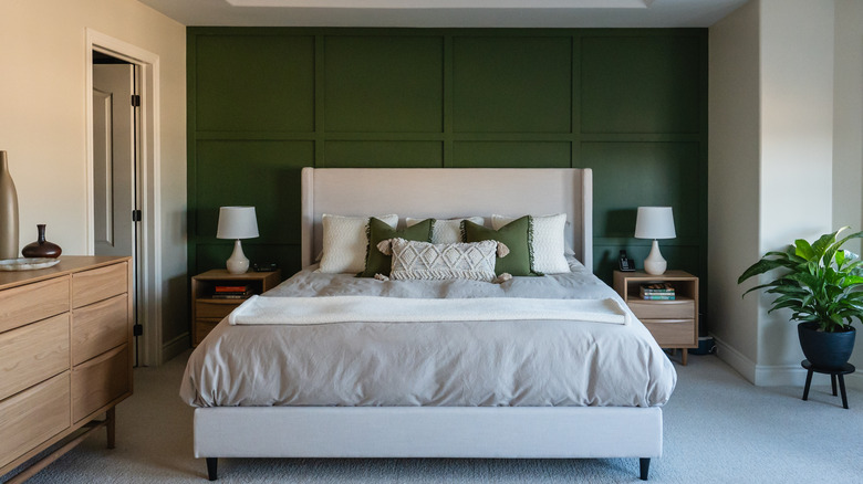Green board-and-batten accent wall