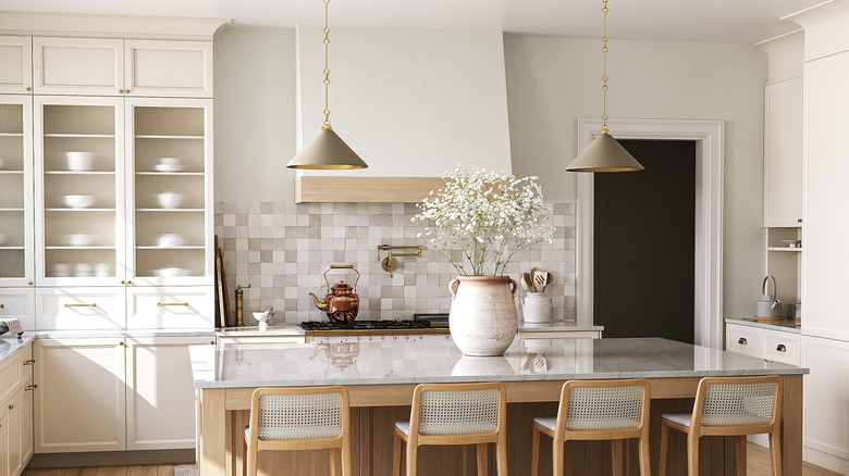 kitchen with a variety of off-white square handmade tiles on the backsplash
