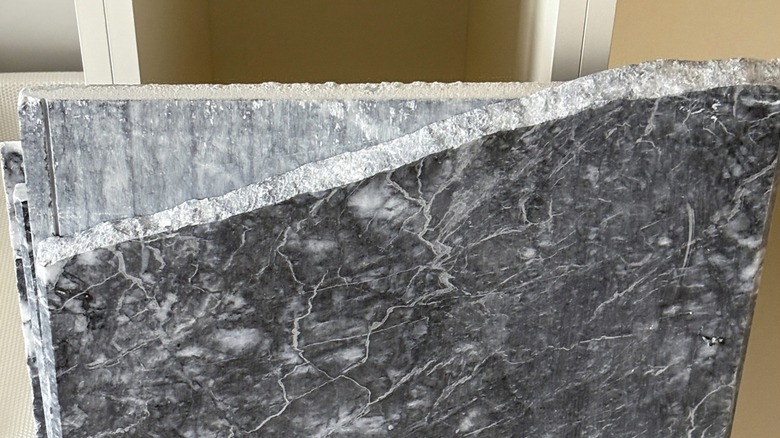Ragged edge of granite slab