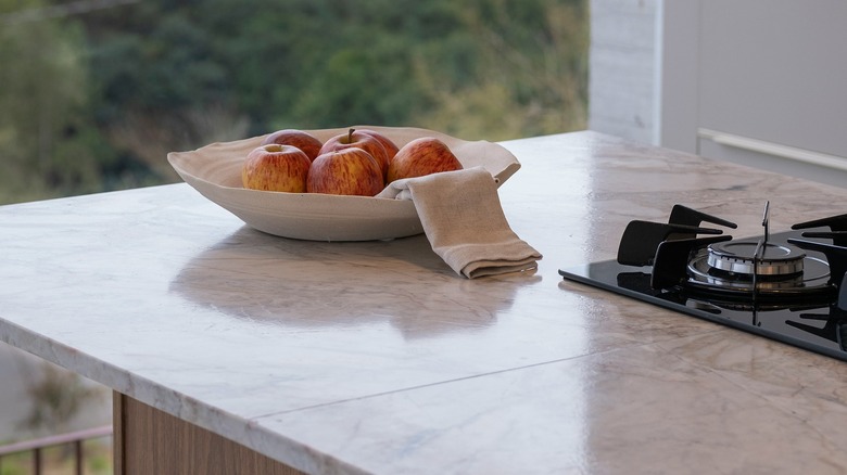 Light colored granite kitchen countertop with visible seam