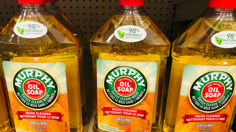 Bottles of Murphy Oil Soap wood cleaner on a shelf.