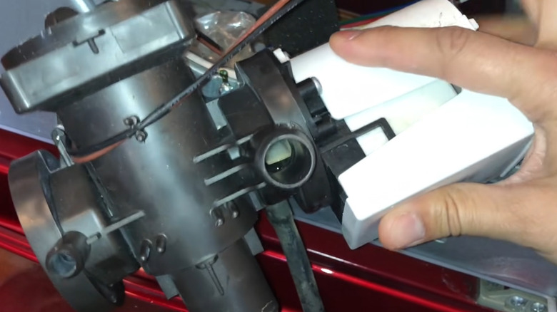 Drain pump assembly and housing from an LG washing machine