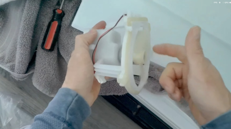Testing an evaporator fan removed from a Kenmore refrigerator