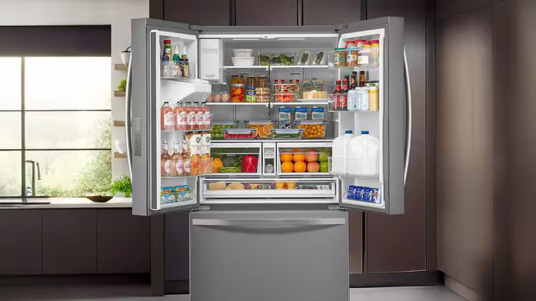 An open Kenmore French door refrigerator
