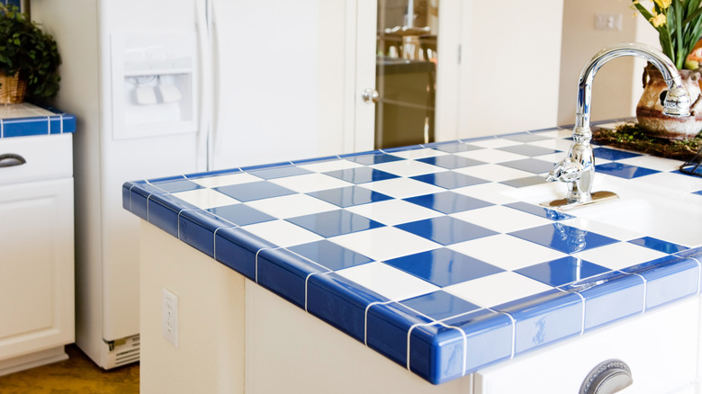 blue and white tile kitchen counter
