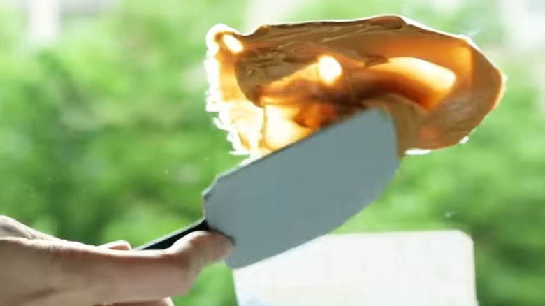 Spreading peanut butter on sticker adhesive residue