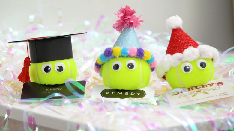 Gift card holders made from tennis balls