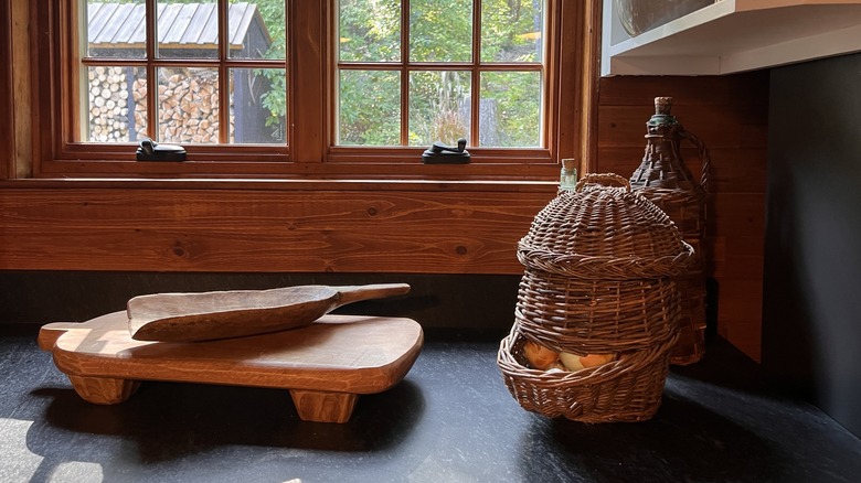 A cutting board on a soapstone countertop