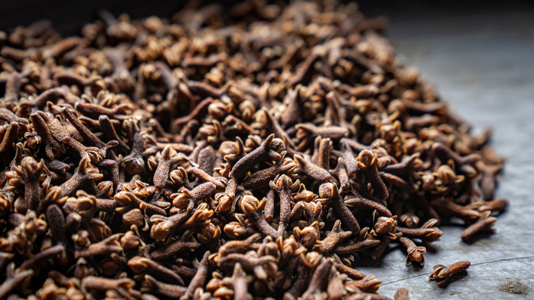 pile of cloves on table