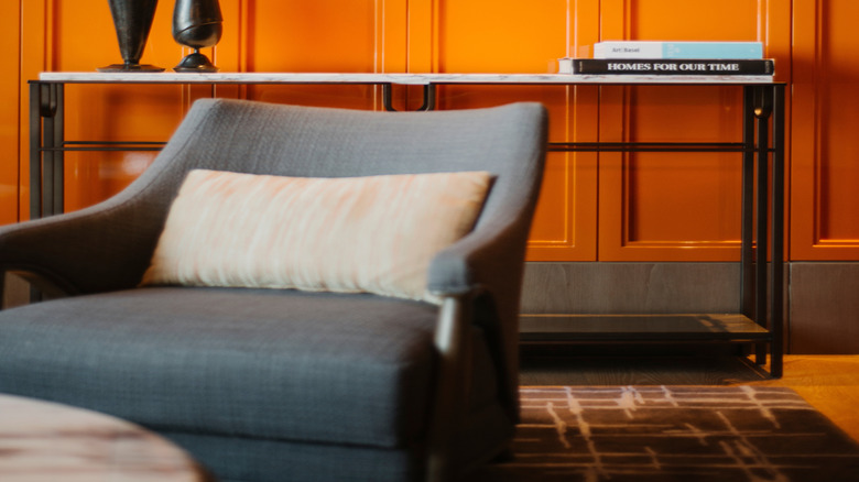 bright orange color drenched wall in livingroom