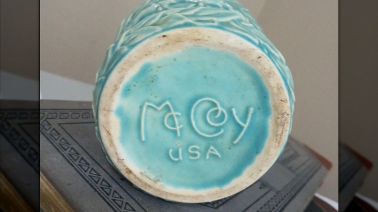 Baby blue McCoy pottery piece with stamp